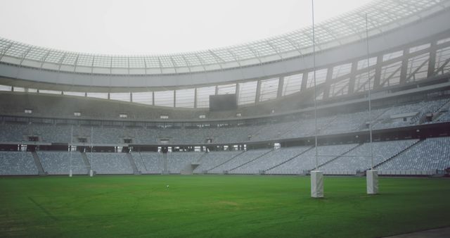 Empty Stadium with Green Field on Foggy Day - Download Free Stock Images Pikwizard.com