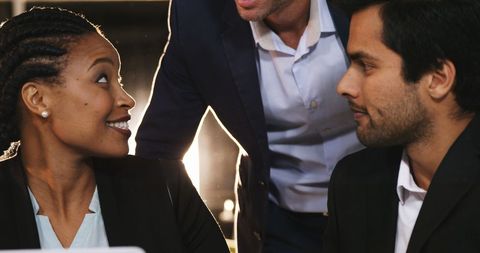 Diverse Team Collaboration in Bright Office Atmosphere