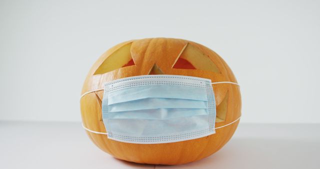 Smiling Jack-O'-Lantern Wearing Surgical Face Mask for Halloween Safety - Download Free Stock Images Pikwizard.com