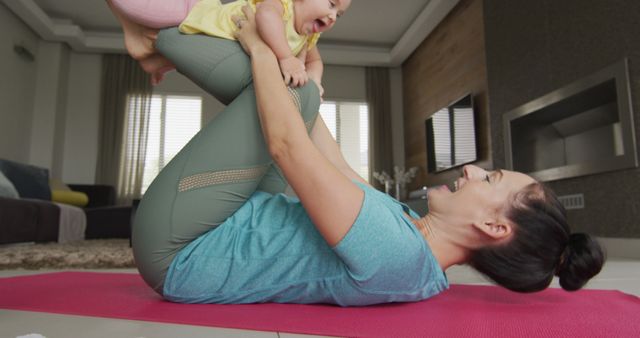 Mother and Baby Exercising Together at Home - Download Free Stock Images Pikwizard.com