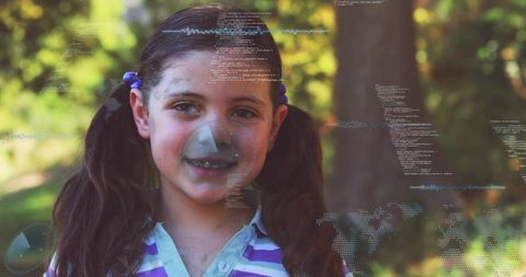 Smiling girl in park with augmented reality code overlay and digital world map interface