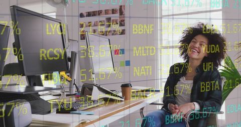 Smiling Biracial Businesswoman with Digital Financial Graphics in Office - Download Free Stock Images Pikwizard.com