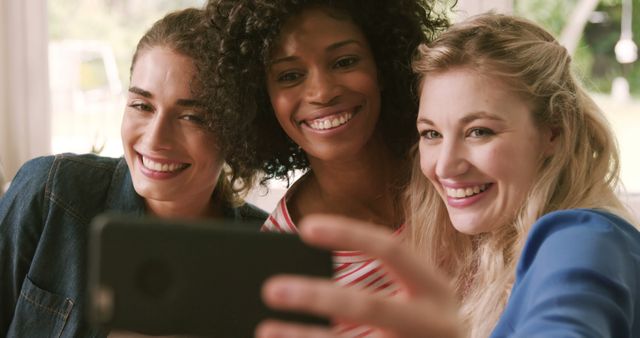 Diverse Group of Smiling Women Taking Selfie Together - Download Free Stock Images Pikwizard.com