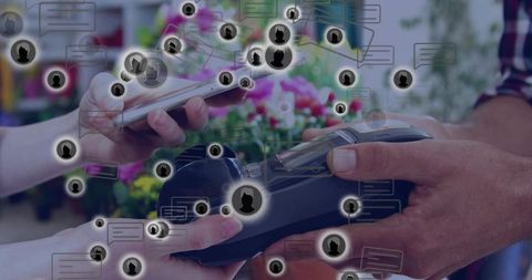 Making contactless payment at florist counter with smartphone and pos terminal