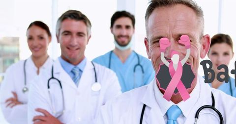 Optimistic doctors supporting breast cancer awareness