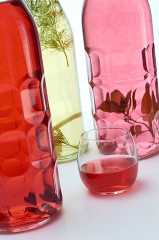 Infused bottles and drink with herbs and flowers