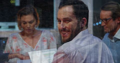 Business Team Collaborating in Office with Digital Interface Overlay