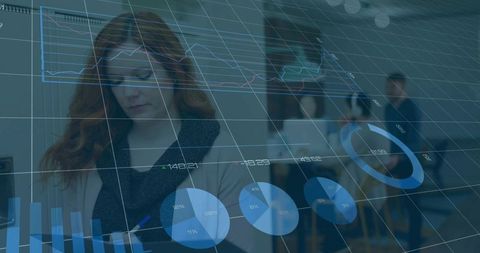 Businesswoman Analyzing Data in Collaborative Office Meeting