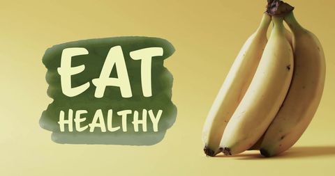 Eat Healthy Message with Bananas on Yellow Background