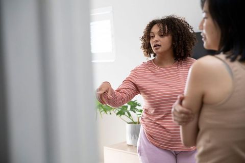 Casual Conversation Between Diverse Female Friends in Bright Modern Room
