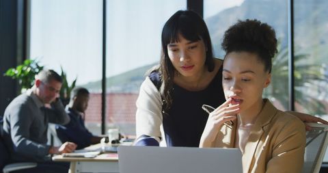 Collaborative Women Professionals Engaging in Modern Office - Download Free Stock Images Pikwizard.com
