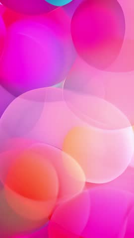 Vertical abstract bubbles floating in pastel pink and purple, translucent layered bokeh video