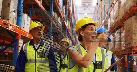 Warehouse Team Communicating with Efficiency in Industrial Environment