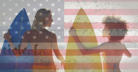 Patriotic Spirit: Two Surfer Women with Constitution Overlay - Download Free Stock Images Pikwizard.com