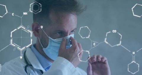 Doctor Wearing Face Mask Amid Digital Chemical Structures