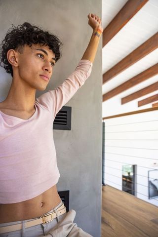 Casual pose in contemporary space highlighting lgbtq pride