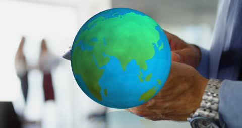 Businessman Using Smartphone with Digital Globe Overlay