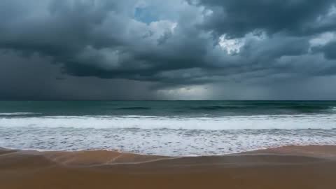 Dramatic Ocean Rolling Waves Under Thunderstorm Skies
