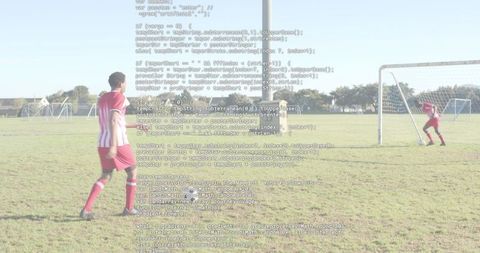 Youth soccer player charging toward goal with transparent code overlay on sunny field