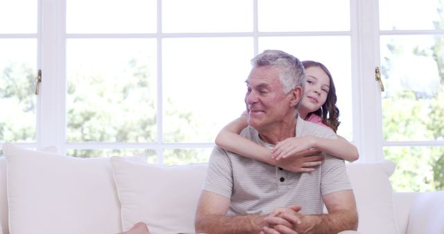 Grandfather and Granddaughter Enjoying Time Together at Home - Download Free Stock Images Pikwizard.com