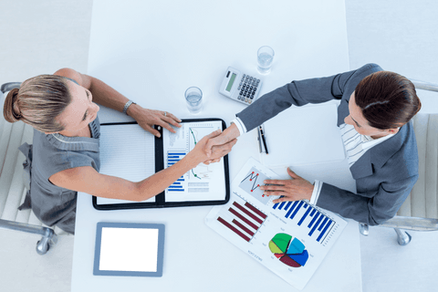 transparent businesswomen shaking hands over contract in office setting - Download Free Stock Videos Pikwizard.com