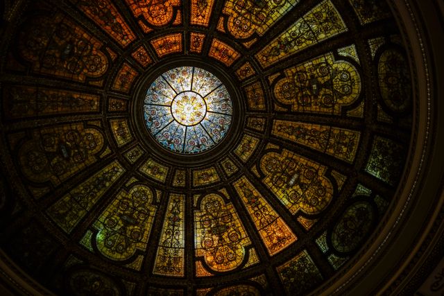 Low angle view of Stained glass dome roof. architecture and design concept 