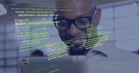 Developer analyzing code on tablet in modern office