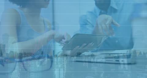 Financial Analysis Team Discussing Data Trends in Modern Office