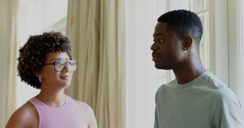 Friends Sharing Joyful Moment at Wedding Celebration