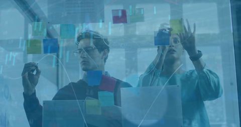 Team Planning Business Strategy with Digital Interface