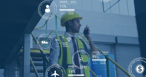 Industrial Worker Communicating with Technological Overlay in Factory - Download Free Stock Images Pikwizard.com