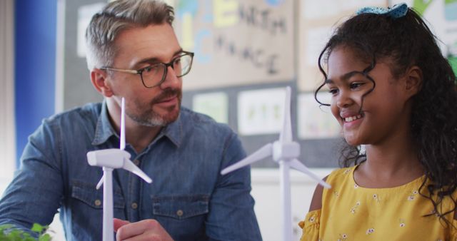 Teacher and Young Student Building Wind Turbines in Classroom - Download Free Stock Images Pikwizard.com