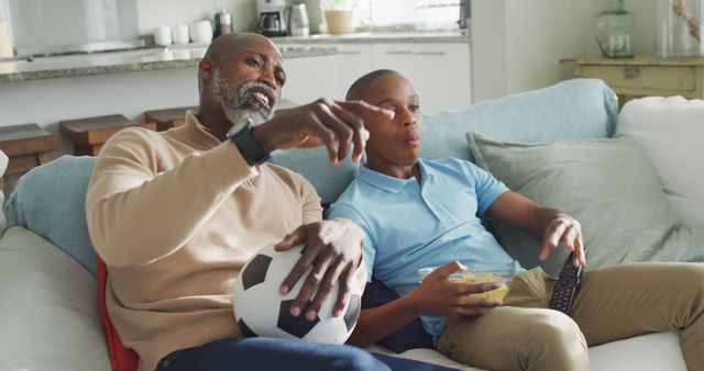 Father and Son Watching Soccer Game on TV at Home - Download Free Stock Images Pikwizard.com