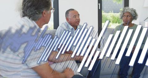 Mature adults discussing care and communication at home with digital soundwave overlay