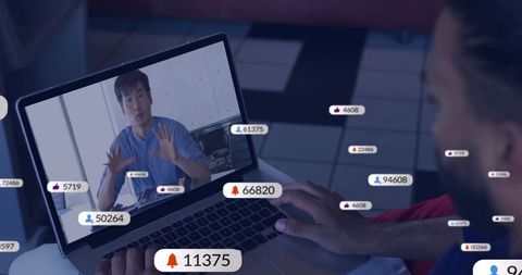Remote webinar on laptop with live viewer counts, likes, notifications and presenter