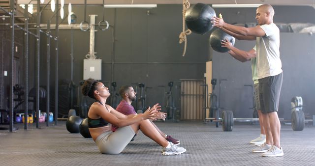 Group Fitness Training with Medicine Balls at Gym - Download Free Stock Images Pikwizard.com