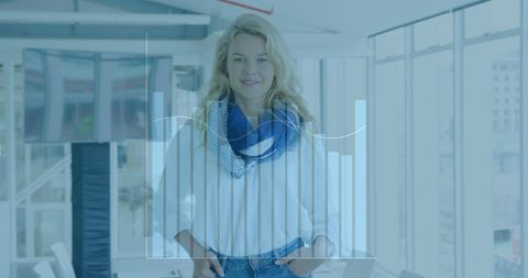 Confident Businesswoman Overlaid with Financial Graphs in Modern Office