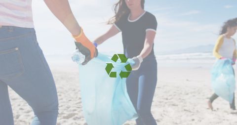 Volunteers Collecting Litter on Beach for Environmental Conservation