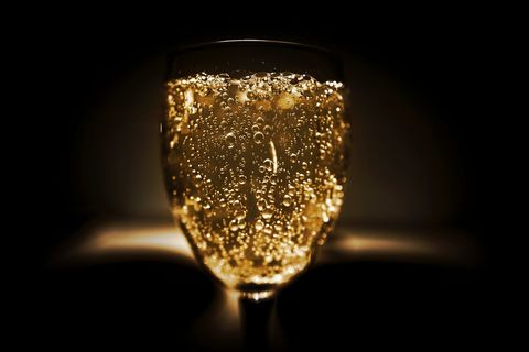 Festive Champagne Glass with Effervescent Bubbles