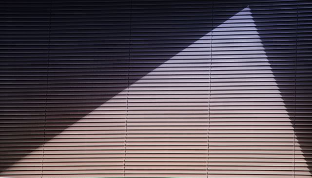 Sunlight Creating Geometric Shape Over Horizontal Blinds - Download Free Stock Photos Pikwizard.com