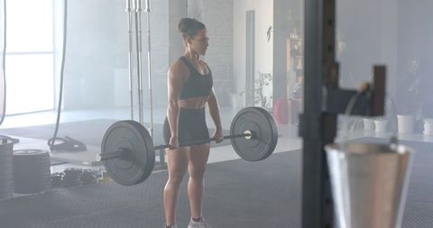 Woman Practicing Deadlifts in Gym - Download Free Stock Images Pikwizard.com
