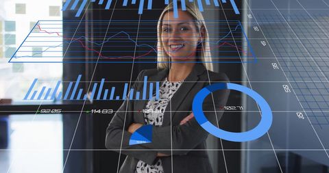 Smiling Businesswoman Surrounded by Digital Graphs in Modern Office - Download Free Stock Images Pikwizard.com