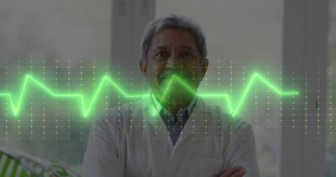 Experienced Doctor Overlapping with Electrocardiogram Graph - Download Free Stock Images Pikwizard.com