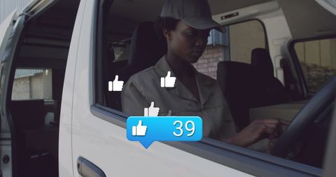 Delivery driver using mobile phone for social media engagement