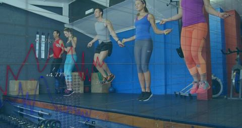 Five-Person Jump Rope Cardio Session Showing Performance Charts and Dynamic Gym Training