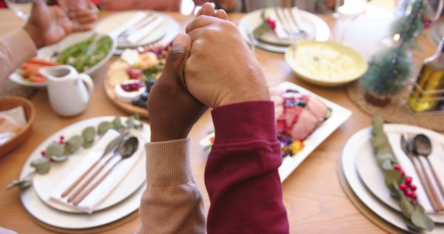 Diverse Friends Celebrating Thanksgiving, Holding Hands Over Festive Meal - Download Free Stock Images Pikwizard.com