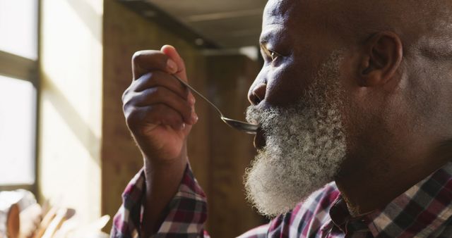 African American Senior Man Enjoying Hot Beverage at Home - Download Free Stock Images Pikwizard.com