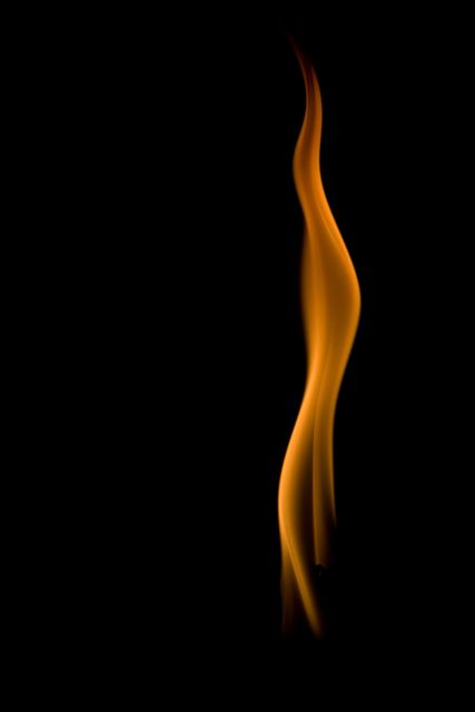 This image captures an abstract shape of a flame against a black backdrop, highlighting the smooth, curving form of the fire. It can be used in contexts emphasizing fire, heat, energy, or artistic designs. Suitable for backgrounds, creative projects, technology, or energy-related content.