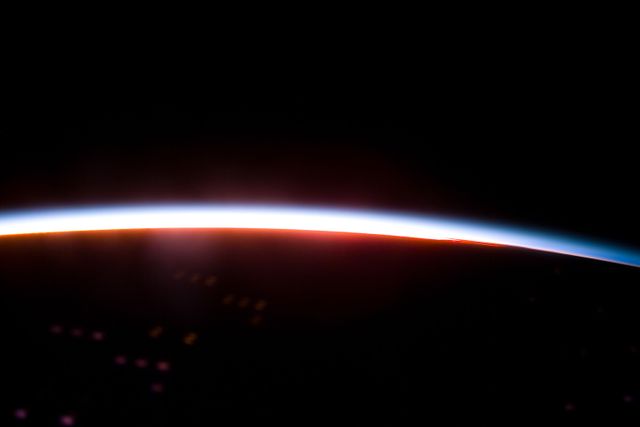 S85-E-5052 (12 August 1997) --- Sunrise over the continental United States, as seen from the Space Shuttle Discovery, on flight day six.  The photograph was taken with the Electronic Still Camera (ESC).