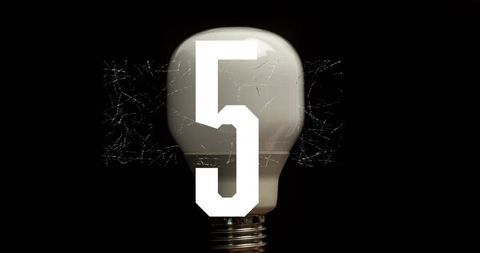 Frosted light bulb showing spiderweb cracks with bold white number 5 overlay on black